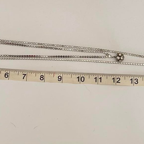 2pc. Silver tone/Long and Short Layered Rhinestone Necklace and Clip Earring set - Picture 5 of 10